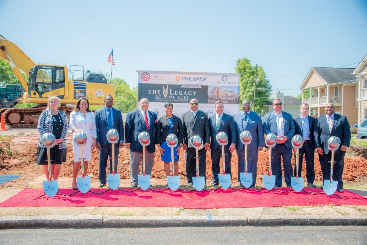 ground breaking pic at Legacy at Vine City, Atlanta, shovels and hardhats